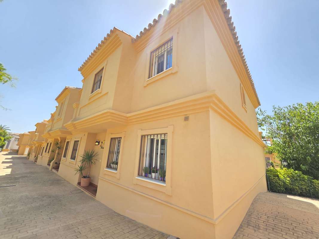 Exclusive Fully Renovated Corner Townhouse in Galera Park, Estepona | Private Lift, Sea Views, Large Garden & Walking Distance to the Beach